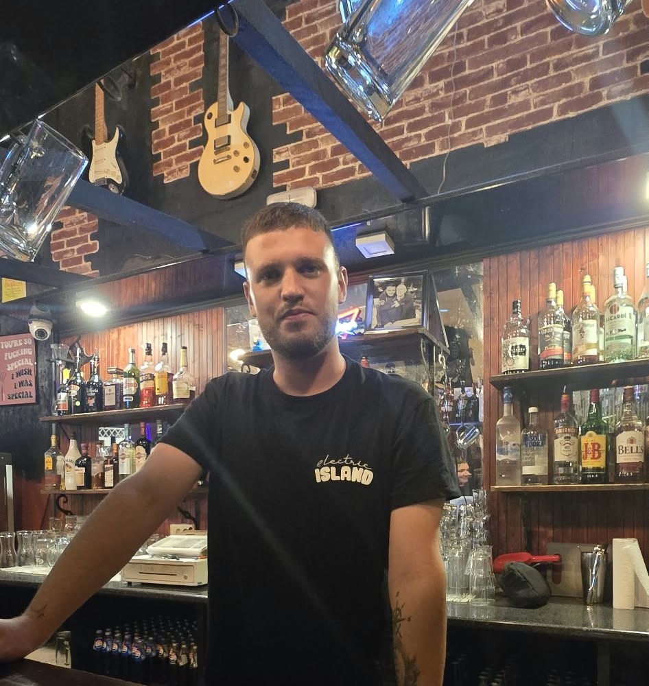 Maikel behind the bar at Electric Island